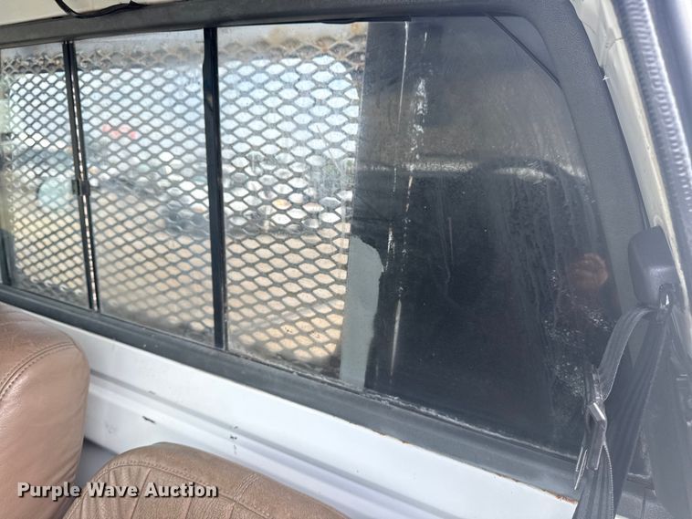 image for item NU9660 1996 GMC Top Kick flatbed truck