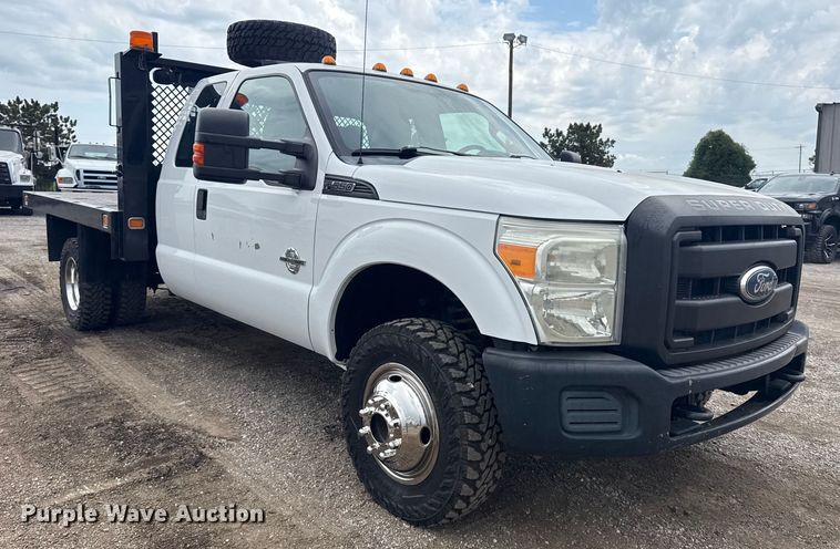 image for item NU9665 2011 Ford F350 Super Duty flatbed pickup truck