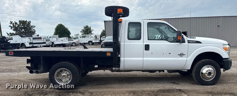 image for item NU9665 2011 Ford F350 Super Duty flatbed pickup truck