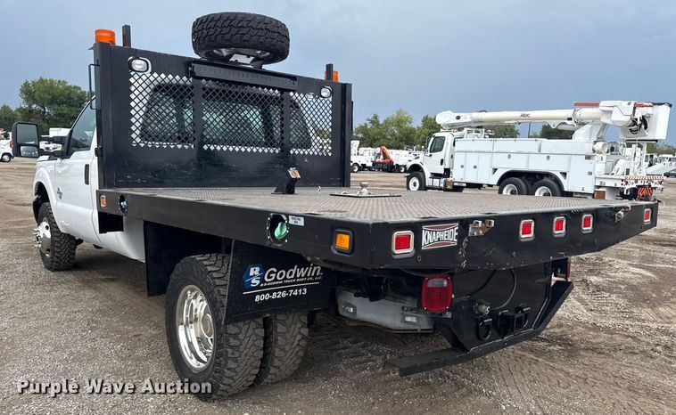 image for item NU9665 2011 Ford F350 Super Duty flatbed pickup truck