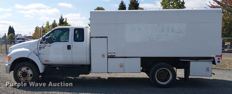 image for item YA1108 2013 Ford F650 Super Duty chipper truck