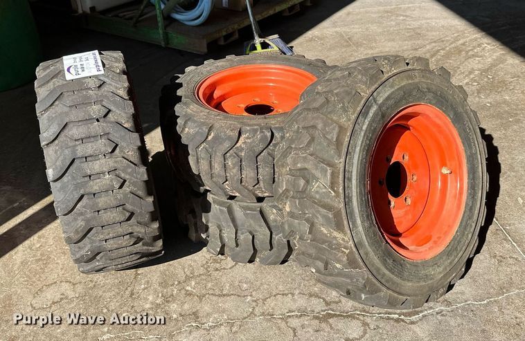 image for item DT6392 (4) Bobcat 27x10.5-15 tires and wheels