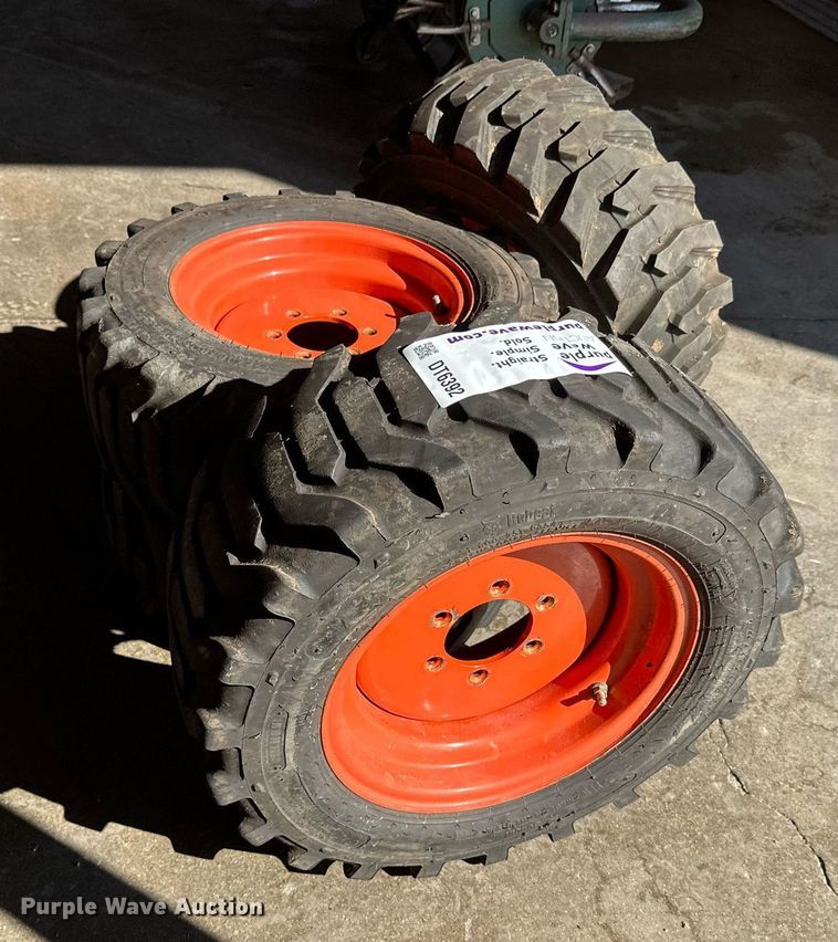 image for item DT6392 (4) Bobcat 27x10.5-15 tires and wheels