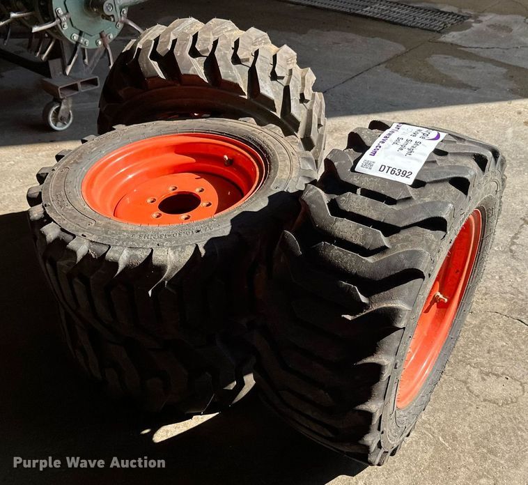 image for item DT6392 (4) Bobcat 27x10.5-15 tires and wheels
