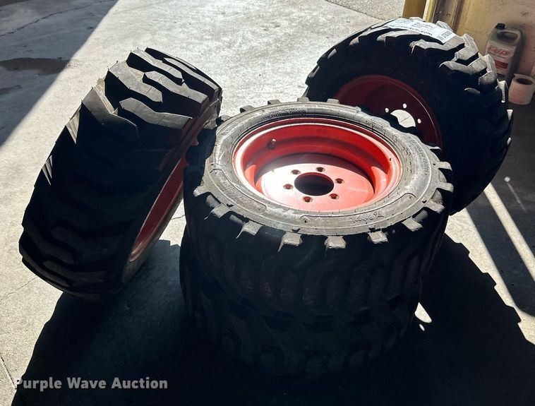 image for item DT6392 (4) Bobcat 27x10.5-15 tires and wheels