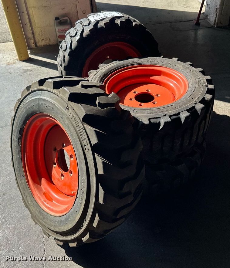 image for item DT6392 (4) Bobcat 27x10.5-15 tires and wheels
