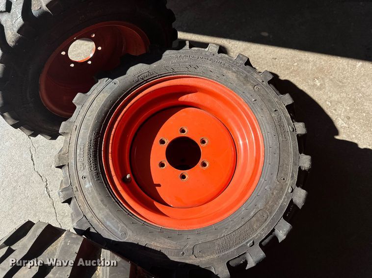 image for item DT6392 (4) Bobcat 27x10.5-15 tires and wheels