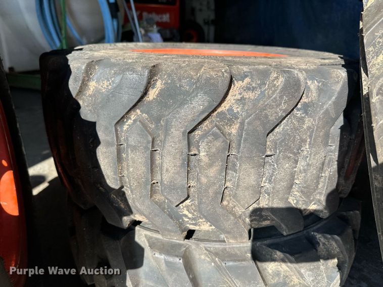 image for item DT6392 (4) Bobcat 27x10.5-15 tires and wheels