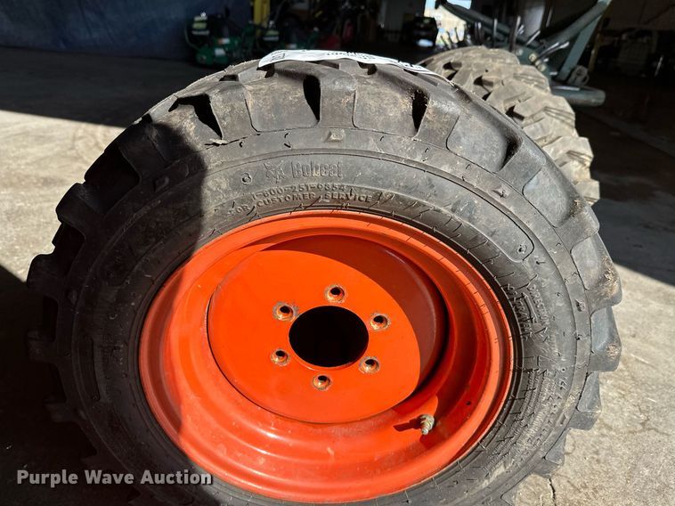 image for item DT6392 (4) Bobcat 27x10.5-15 tires and wheels