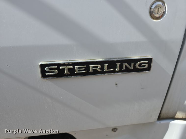 image for item DW3154 2000 Sterling L9500 grapple truck