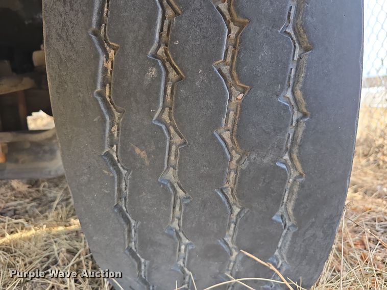 image for item DW3154 2000 Sterling L9500 grapple truck