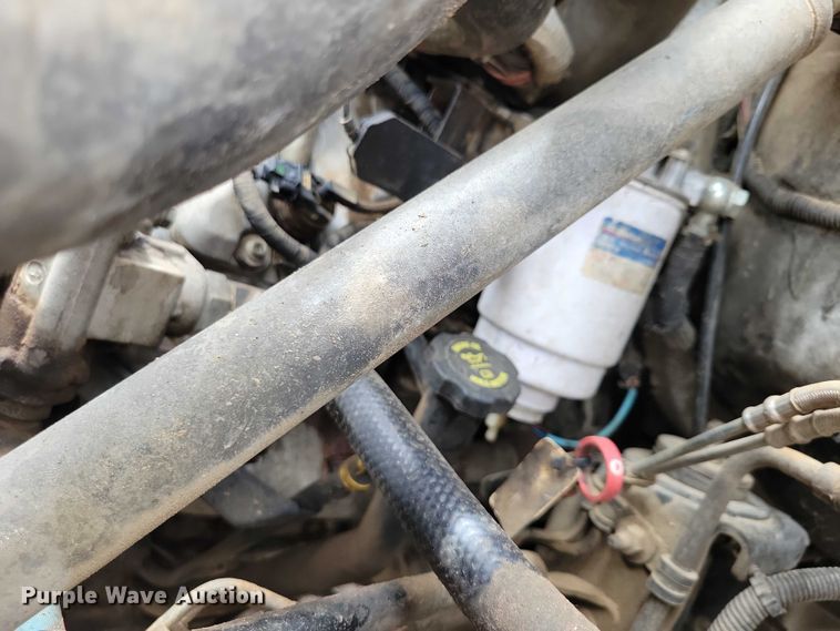 image for item DX7188 2006 Chevrolet C5500 Crew Cab flatbed truck