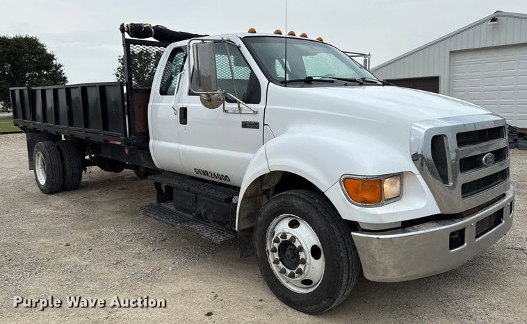 image for item DY8108 2004 Ford F650 Super Duty Crew Cab dump flatbed truck