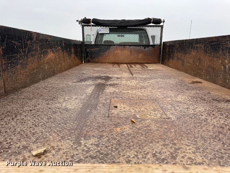 image for item DY8108 2004 Ford F650 Super Duty Crew Cab dump flatbed truck