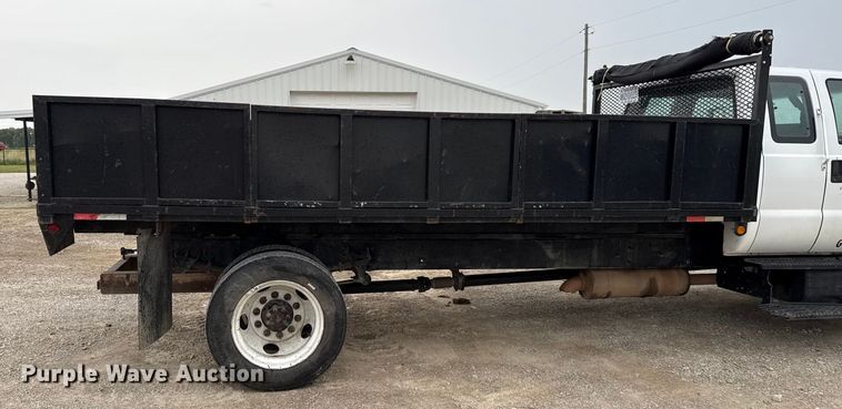image for item DY8108 2004 Ford F650 Super Duty Crew Cab dump flatbed truck