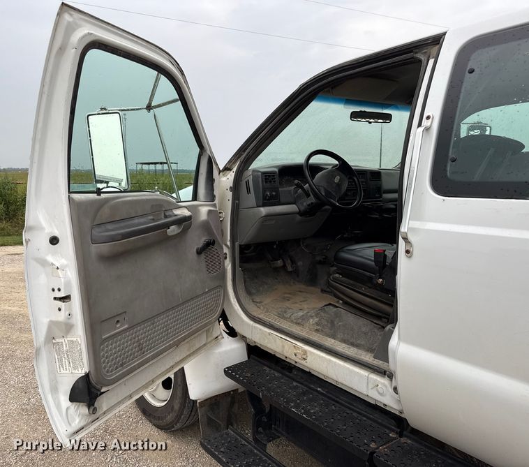 image for item DY8108 2004 Ford F650 Super Duty Crew Cab dump flatbed truck