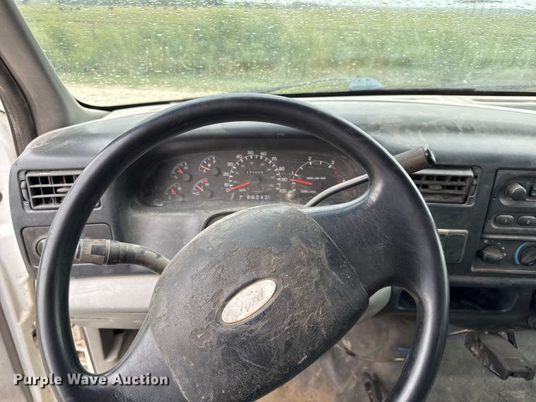 image for item DY8108 2004 Ford F650 Super Duty Crew Cab dump flatbed truck