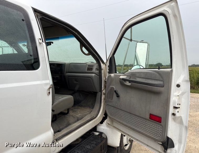 image for item DY8108 2004 Ford F650 Super Duty Crew Cab dump flatbed truck