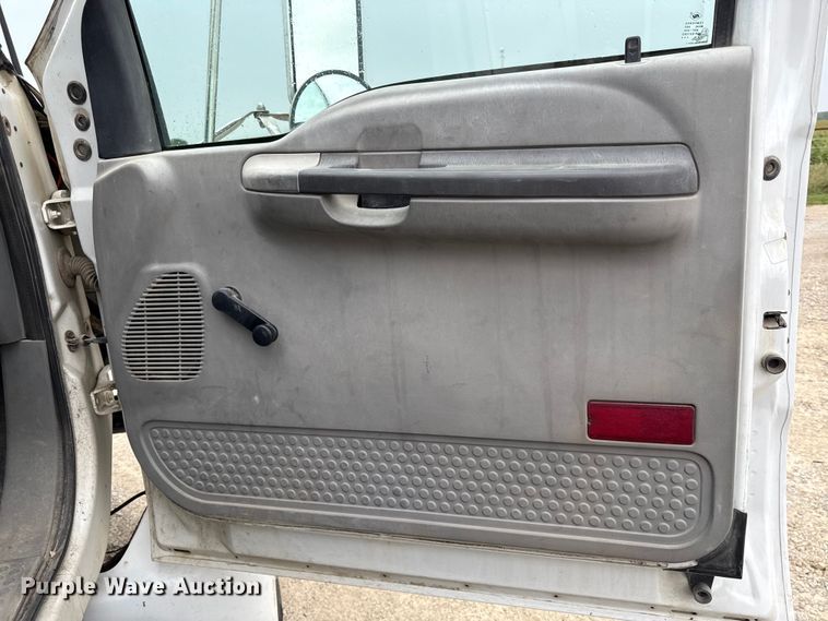 image for item DY8108 2004 Ford F650 Super Duty Crew Cab dump flatbed truck