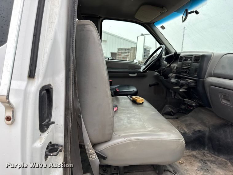 image for item DY8108 2004 Ford F650 Super Duty Crew Cab dump flatbed truck