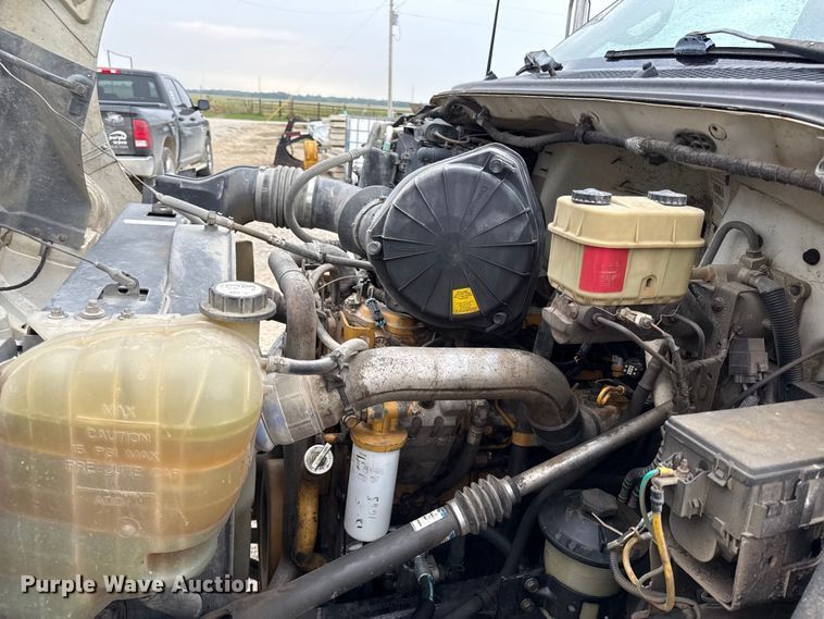 image for item DY8108 2004 Ford F650 Super Duty Crew Cab dump flatbed truck