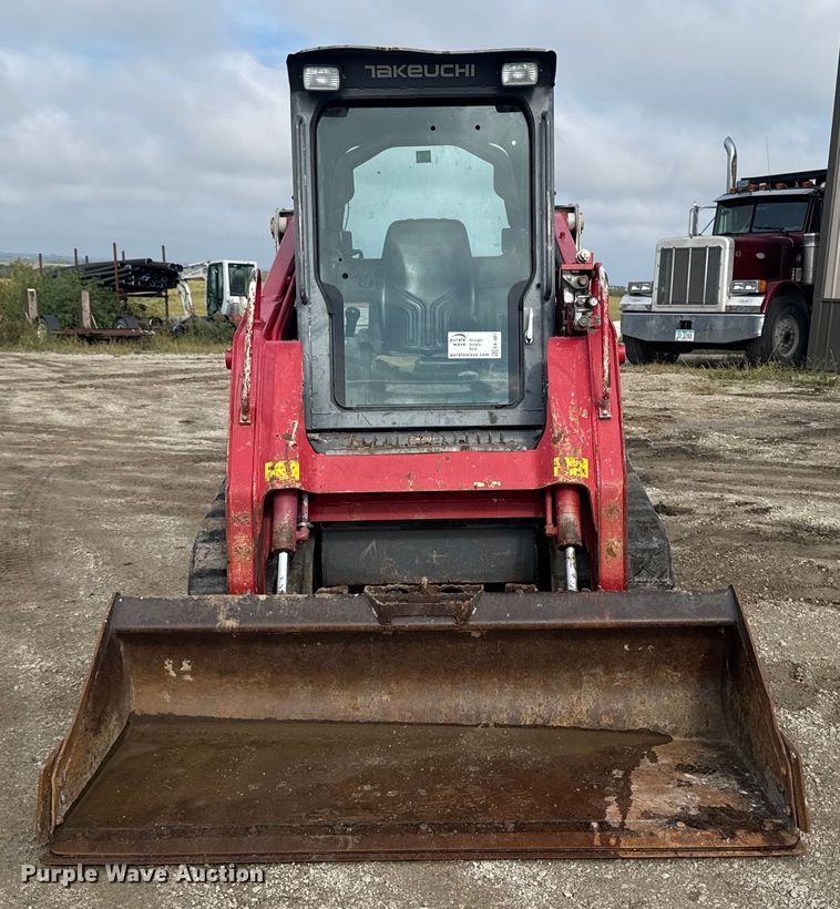 MINI CARGADOR SOBRE ORUGAS 2014 TAKEUCHI TL10