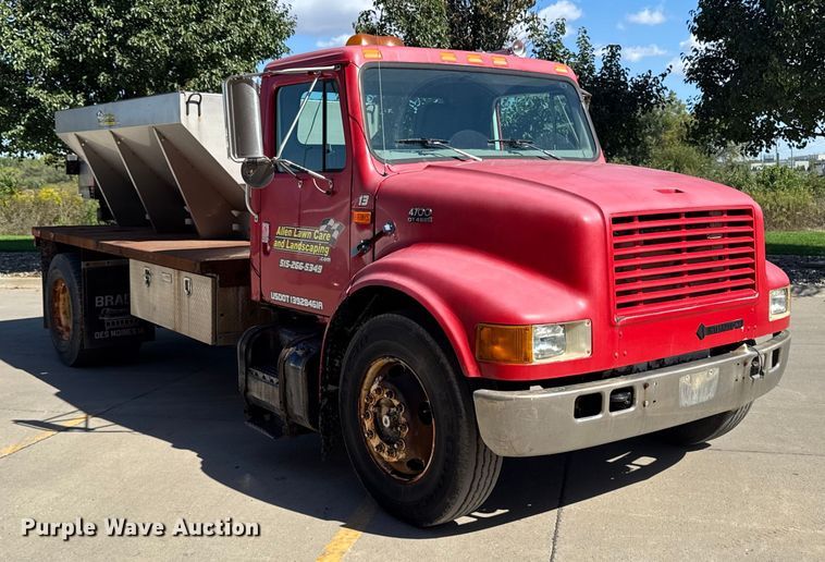 image for item EA1900 1999 International 4900 flatbed truck