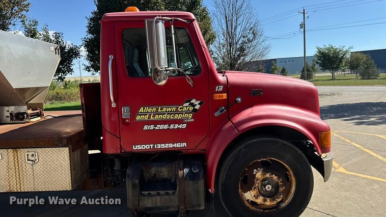 image for item EA1900 1999 International 4900 flatbed truck