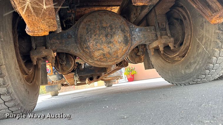 image for item EA1900 1999 International 4900 flatbed truck