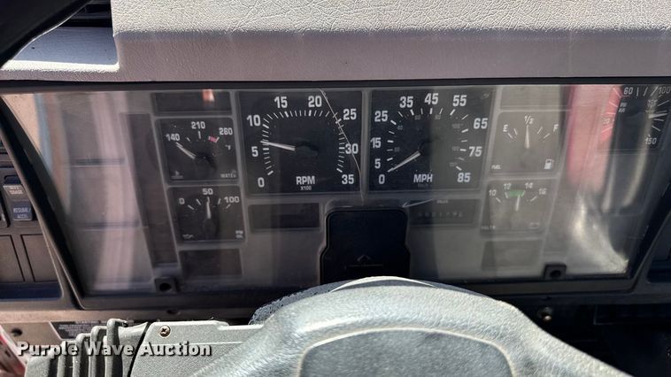 image for item EA1900 1999 International 4900 flatbed truck