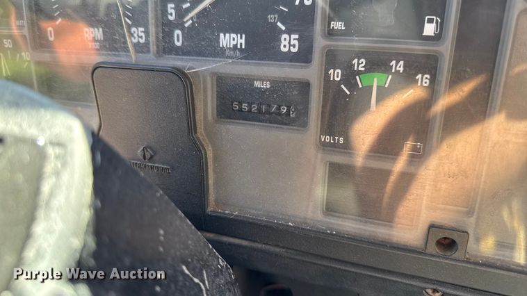 image for item EA1900 1999 International 4900 flatbed truck