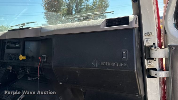 image for item EA1900 1999 International 4900 flatbed truck