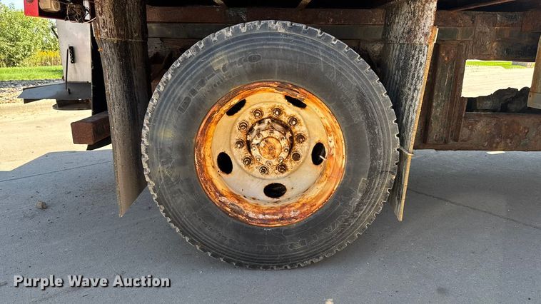 image for item EA1900 1999 International 4900 flatbed truck