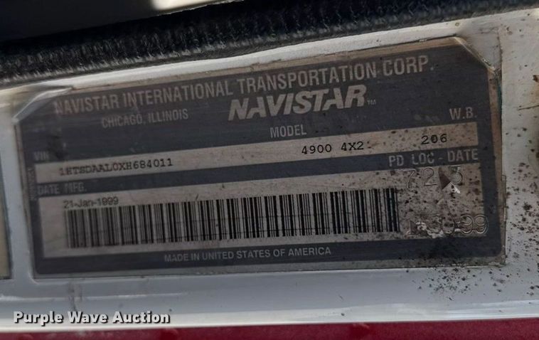 image for item EA1900 1999 International 4900 flatbed truck