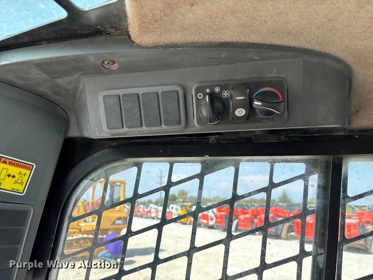 image for item EN7005 2012 Caterpillar 289C2 skid steer loader