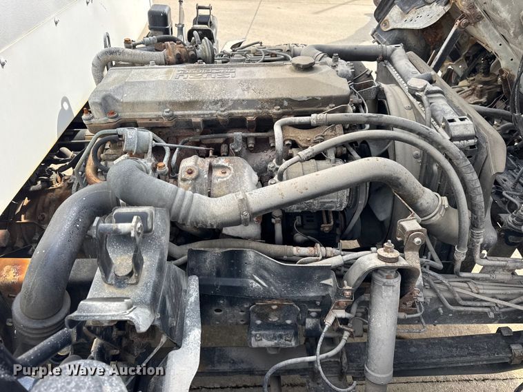 image for item ER0131 2002 Isuzu NQR flatbed truck