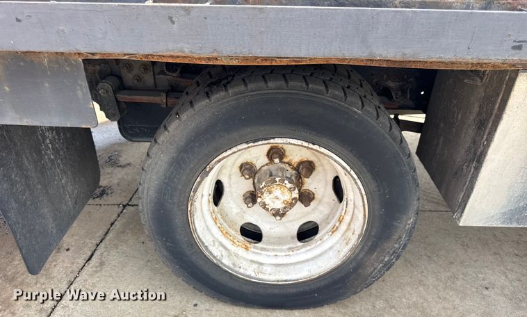 image for item ER0131 2002 Isuzu NQR flatbed truck