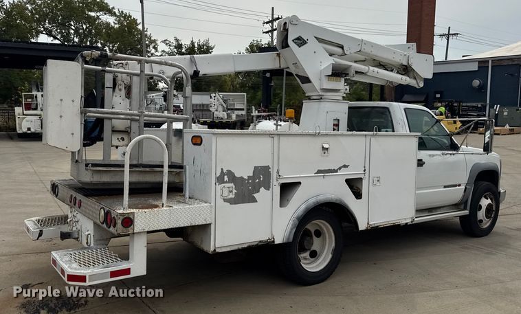 CAMIóN CON CANASTILLA 2000 GMC VERSALIFT