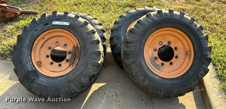 image for item ET3276 (4) 12-16.5L skid steer tires and wheels