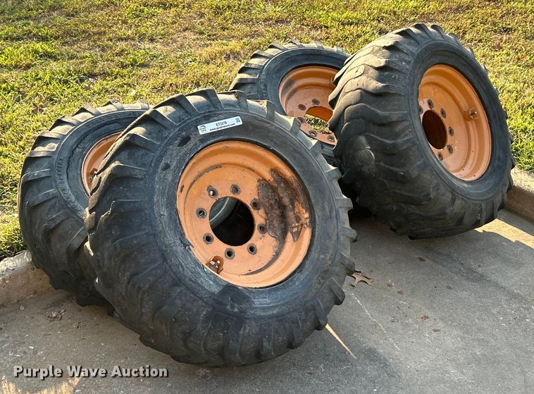 image for item ET3276 (4) 12-16.5L skid steer tires and wheels
