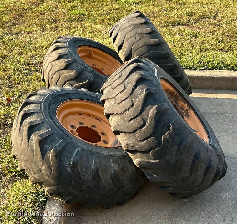 image for item ET3276 (4) 12-16.5L skid steer tires and wheels