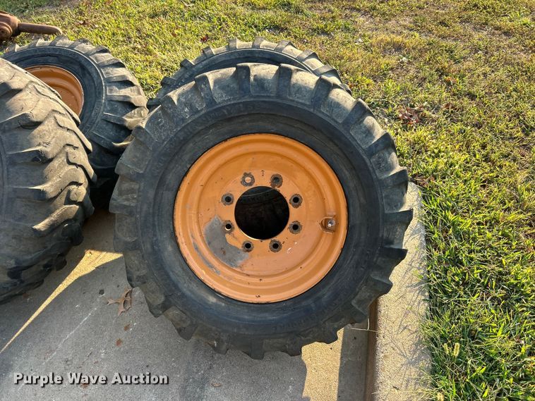 image for item ET3276 (4) 12-16.5L skid steer tires and wheels