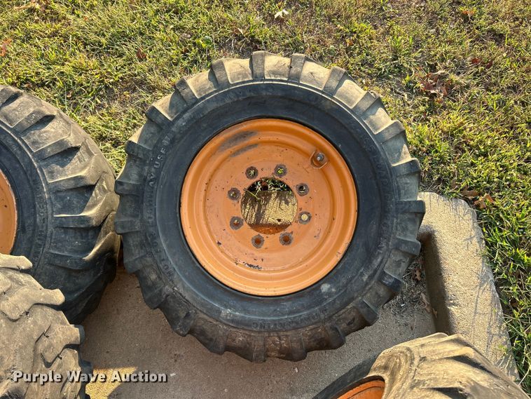 image for item ET3276 (4) 12-16.5L skid steer tires and wheels