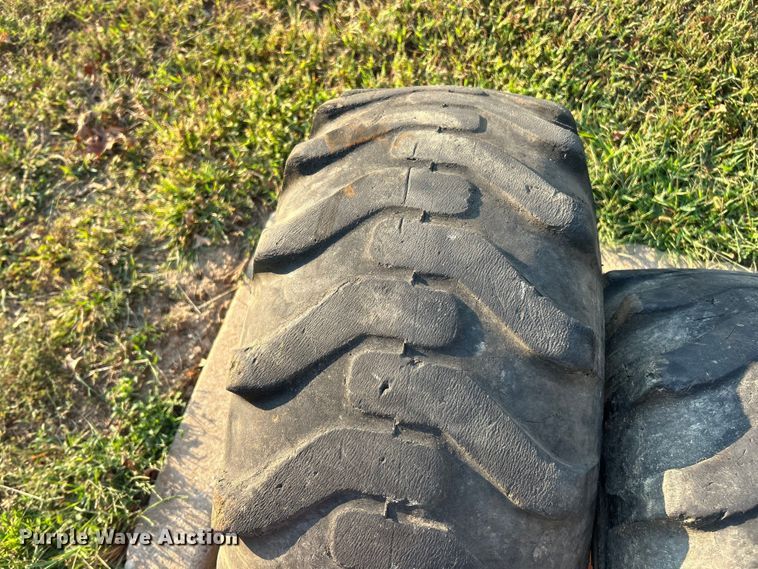 image for item ET3276 (4) 12-16.5L skid steer tires and wheels