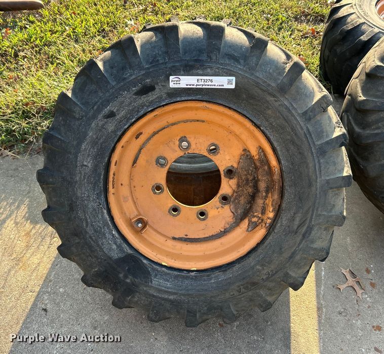 image for item ET3276 (4) 12-16.5L skid steer tires and wheels