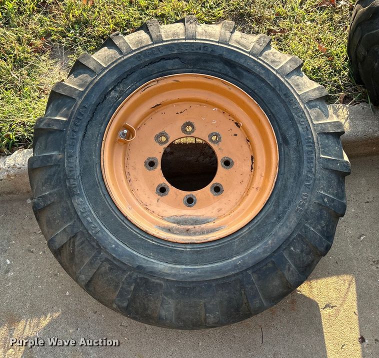 image for item ET3276 (4) 12-16.5L skid steer tires and wheels