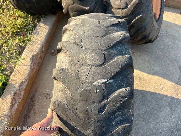 image for item ET3276 (4) 12-16.5L skid steer tires and wheels