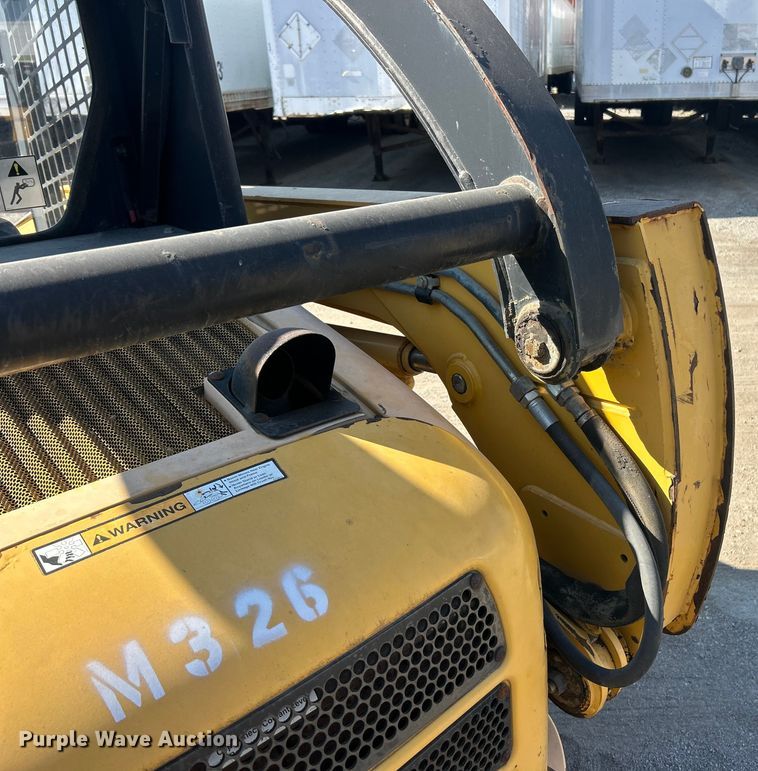 image for item ET3453 2003 John Deere 260  skid steer loader