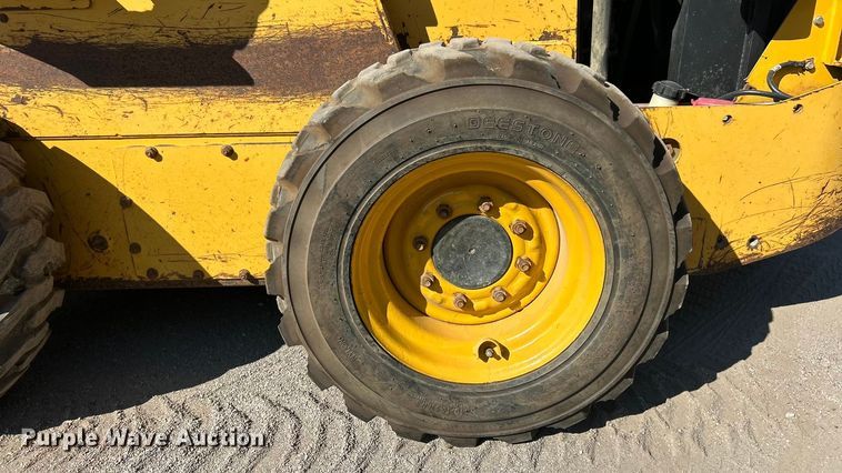 image for item ET3453 2003 John Deere 260  skid steer loader