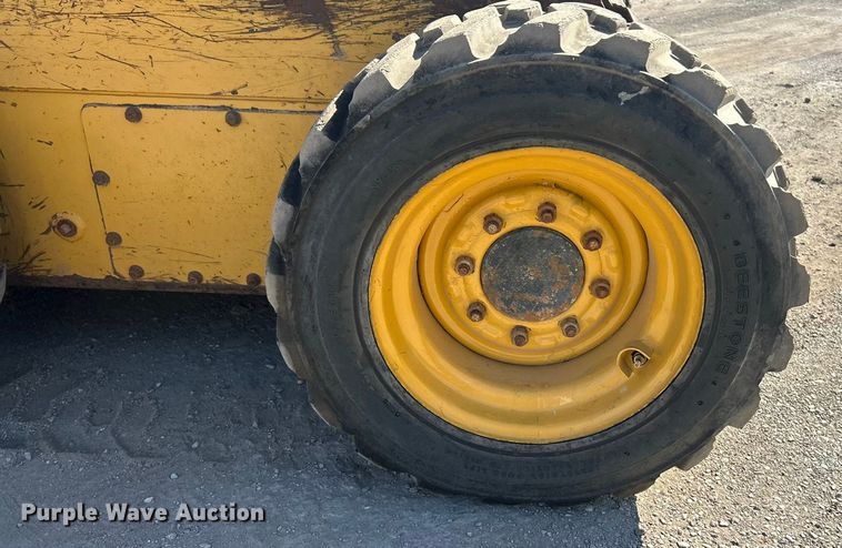 image for item ET3453 2003 John Deere 260  skid steer loader